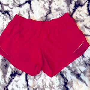 Lululemon size L? Athletic red running shorts built in underwear. 12 in circle